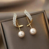 Chic Gold Earrings with Elegant Pearl Drops