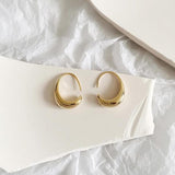 Gold and Silver Oval Hoop Earrings